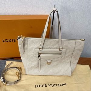 05. Louis Vuitton Neige Monogram Empreinte Leather Lumineuse PM Bag